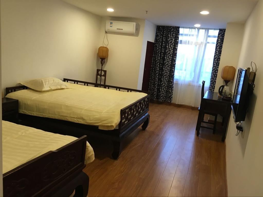 Tun XI Lodge Хуаншан Стая снимка