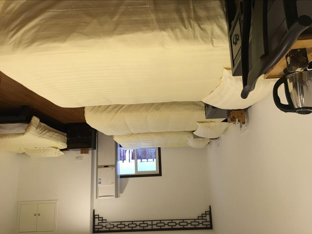 Tun XI Lodge Хуаншан Стая снимка